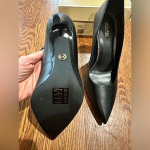 New - never worn Michael Kors leather pumps